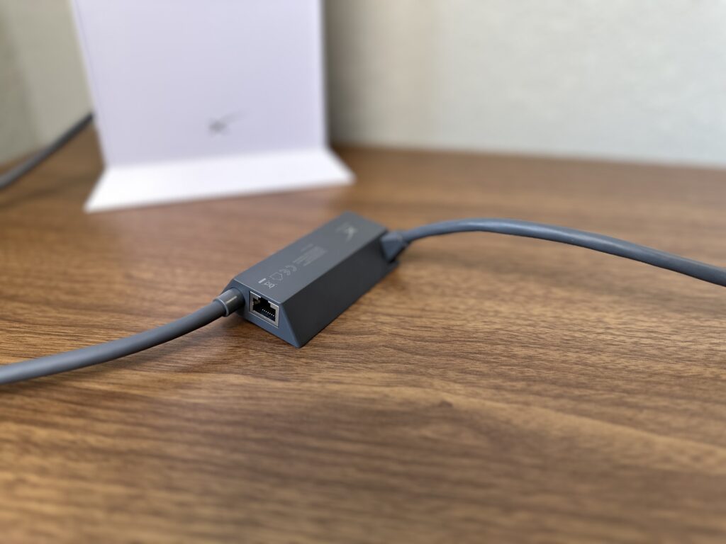 Starlink cable connected to the Ethernet Adapter