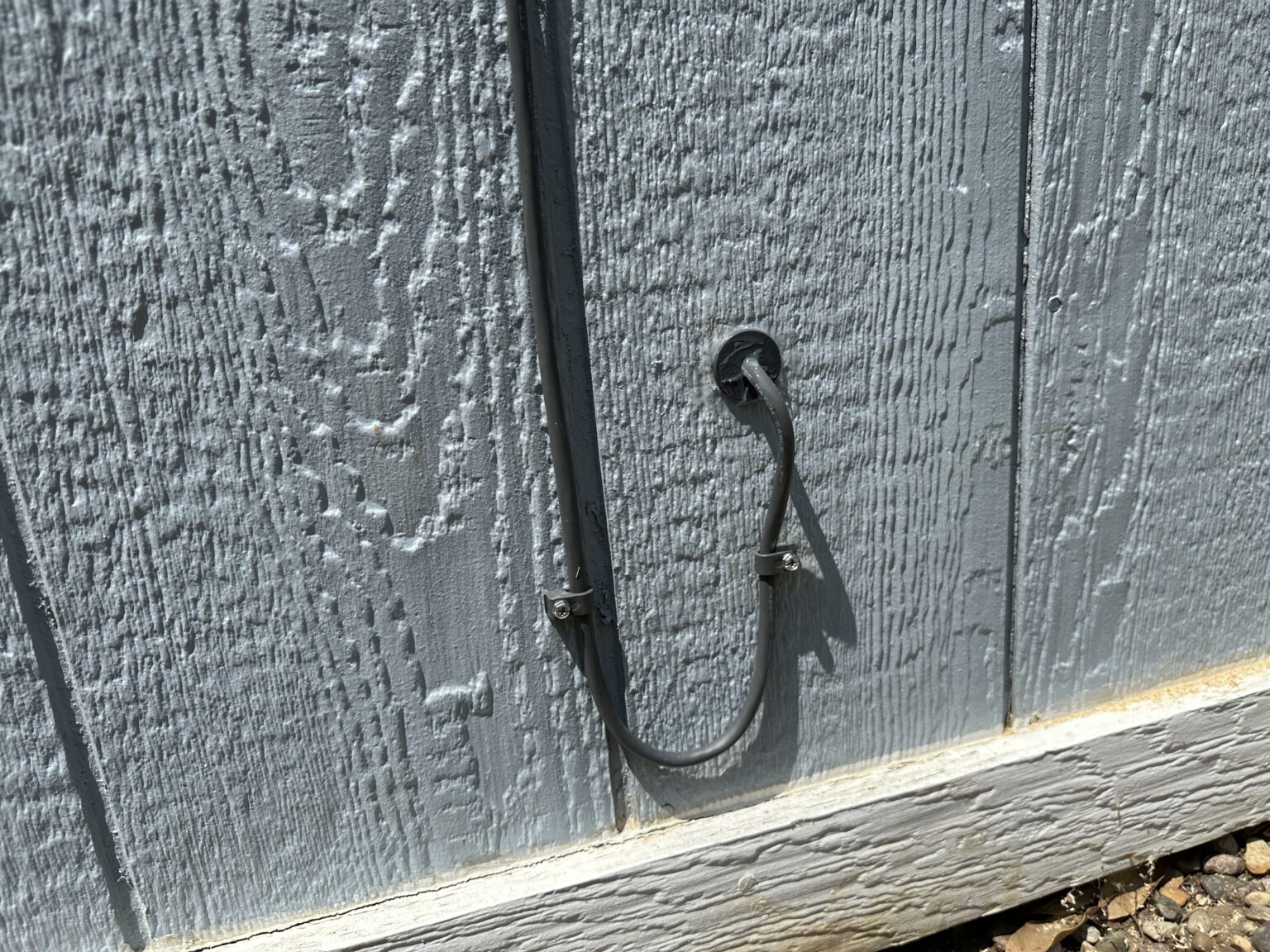 Starlink cable routed through an exterior wall.