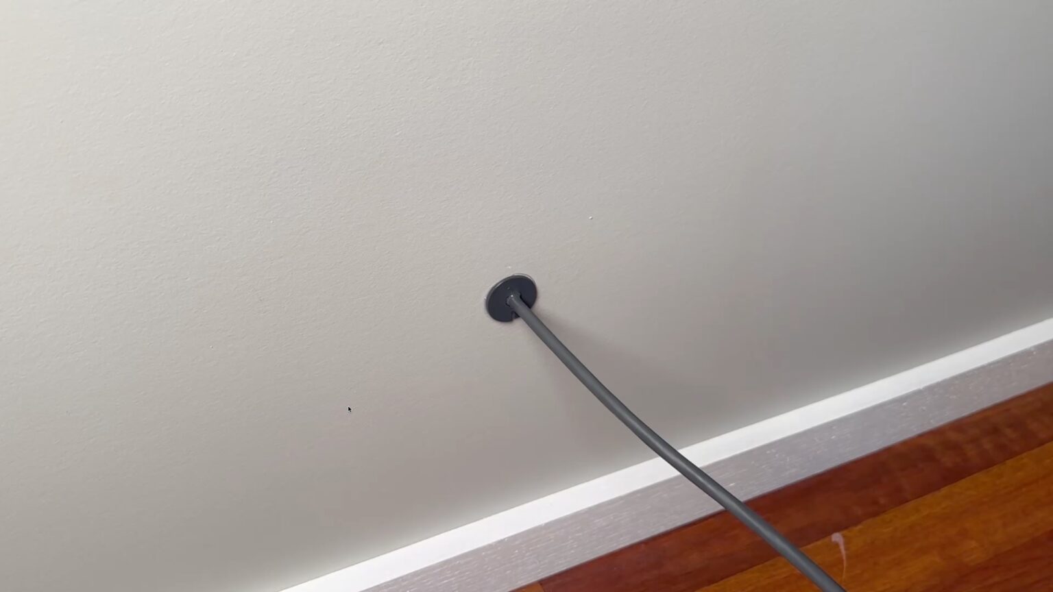 Starlink cable grommet installed in drywall