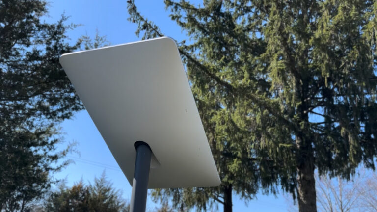 A Starlink Gen 2 dish underneath trees